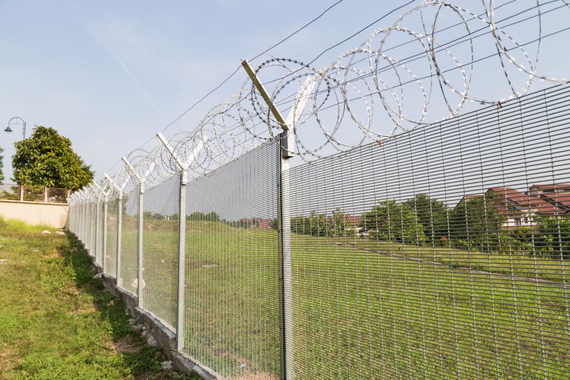 Security Fence with Barbed Wire